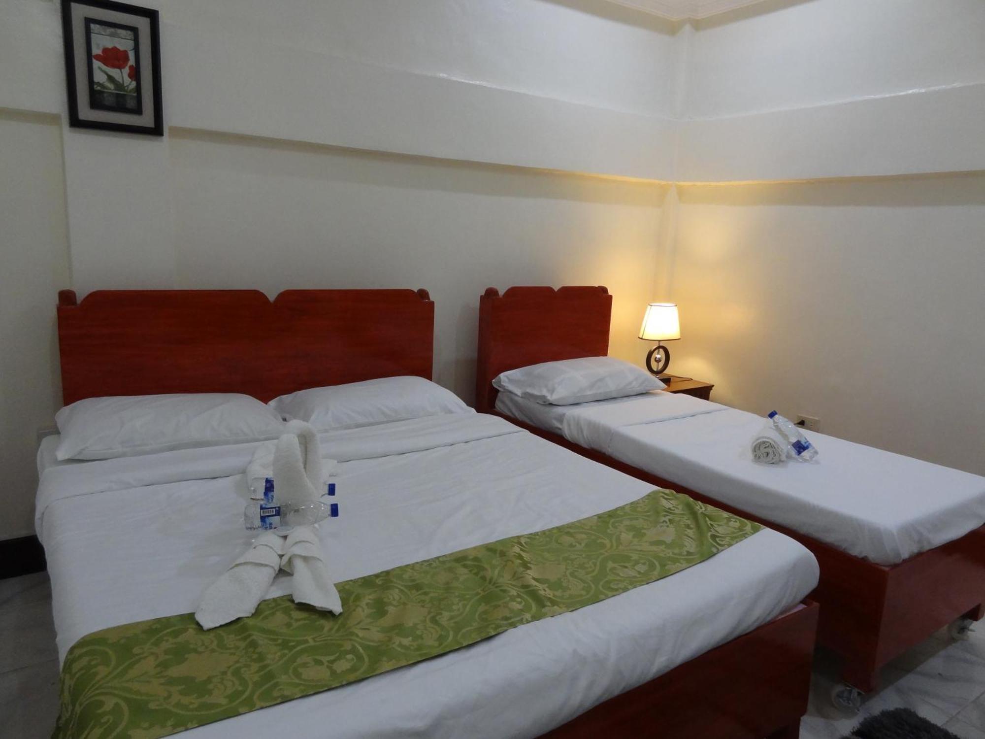 The Executive Villa Inn & Suites Davao Habitación foto