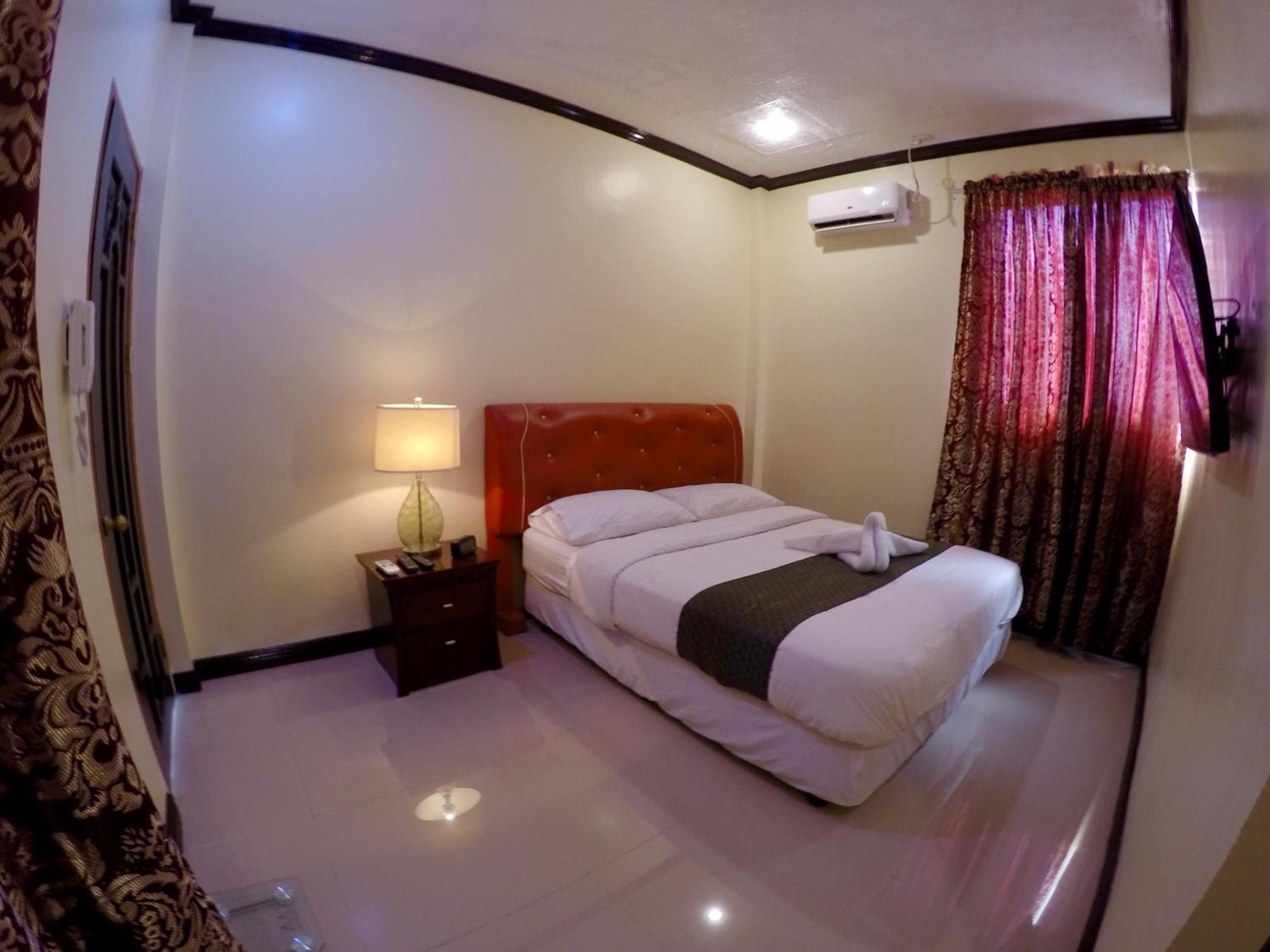 The Executive Villa Inn & Suites Davao Habitación foto