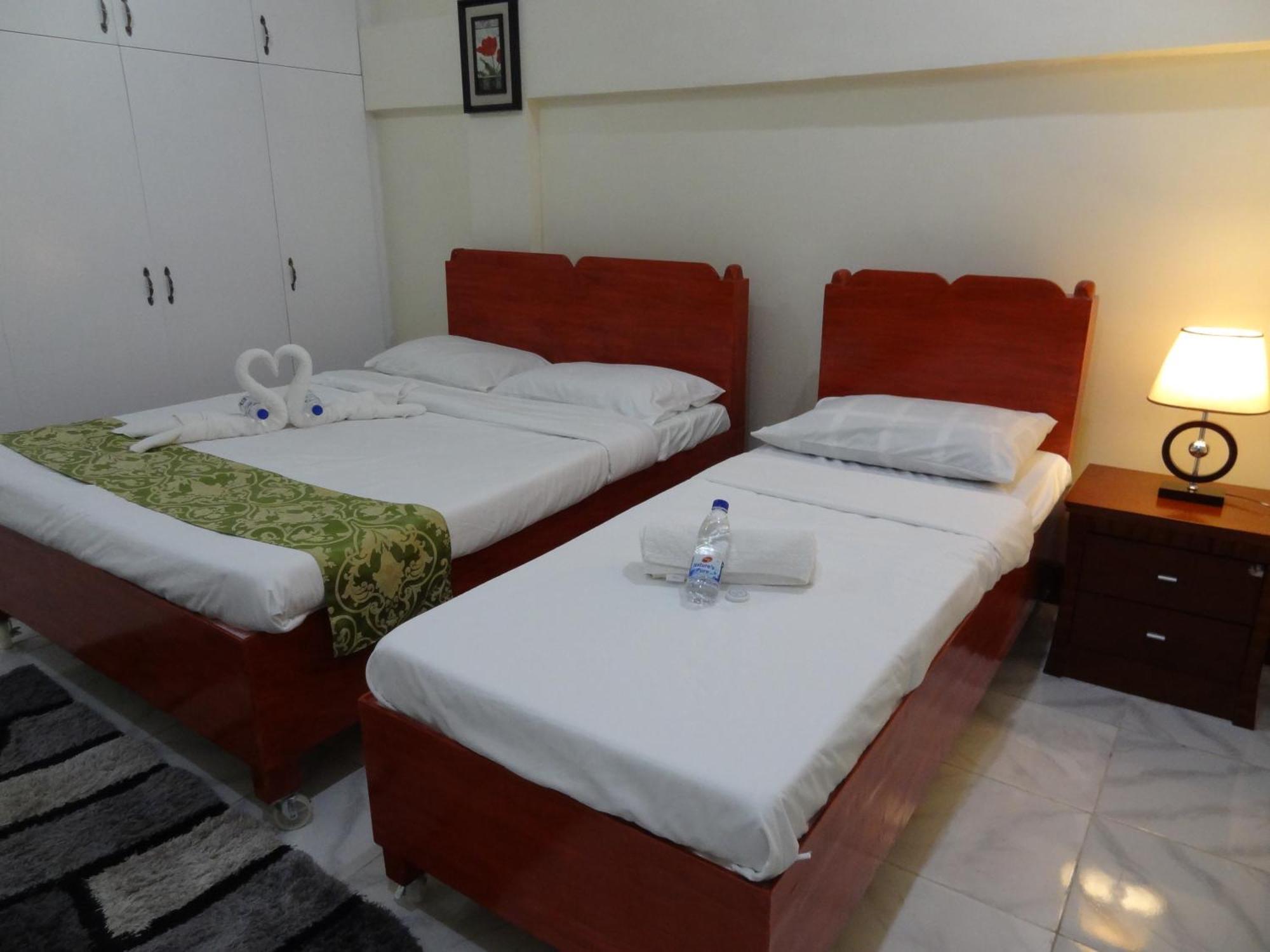 The Executive Villa Inn & Suites Davao Habitación foto