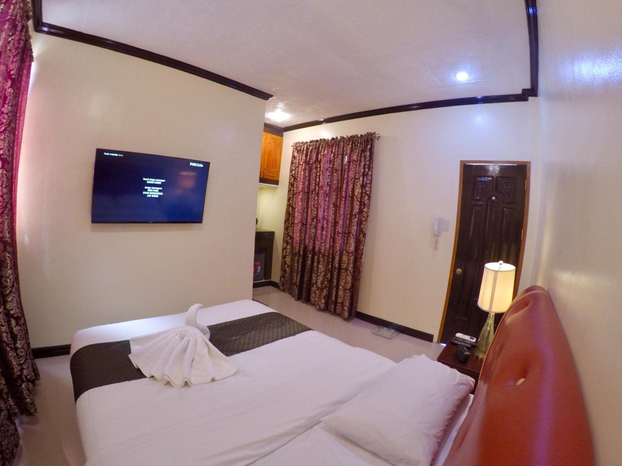 The Executive Villa Inn & Suites Davao Habitación foto